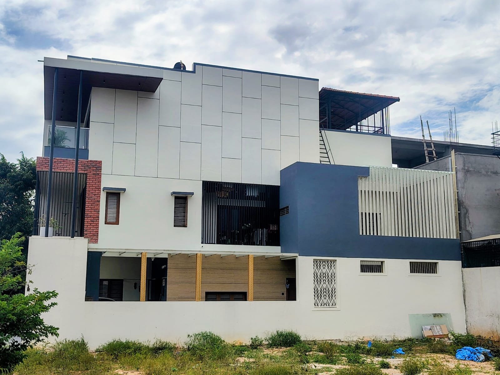 Four-storey residence with planted balconies on every level